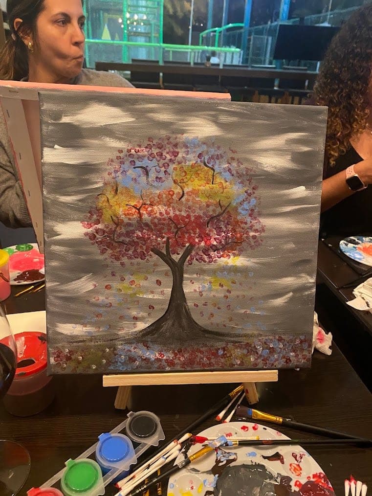 An autumn tree painting at the session