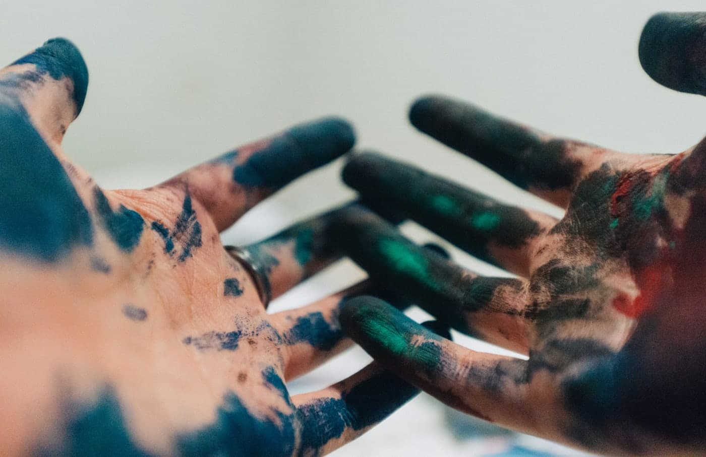 Hands painting on canvas